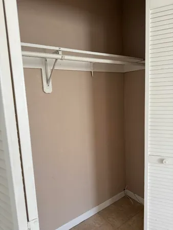 a view of a room with racks on the wall