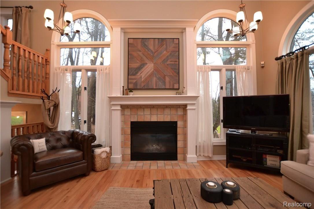 469 John R Street Milford, MI 48381 - Photo 6 of 40 Fireplace Flanked By Floor To Ceiling Windows