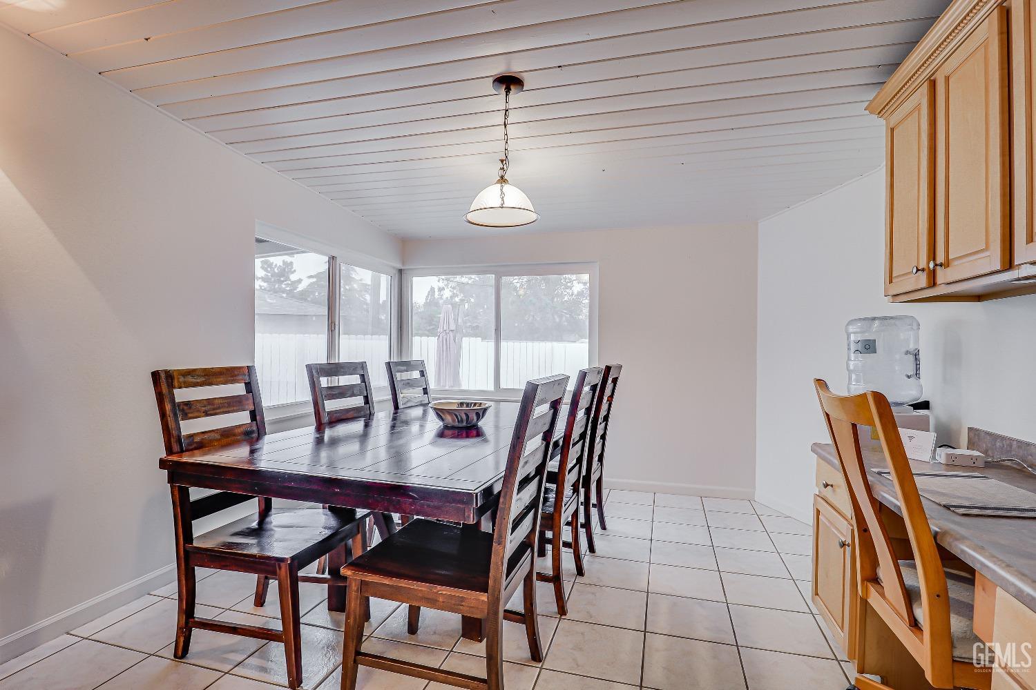Undisclosed Address Bakersfield, CA 93305 - Photo 17 of 24 a view of a dining room with furniture and window