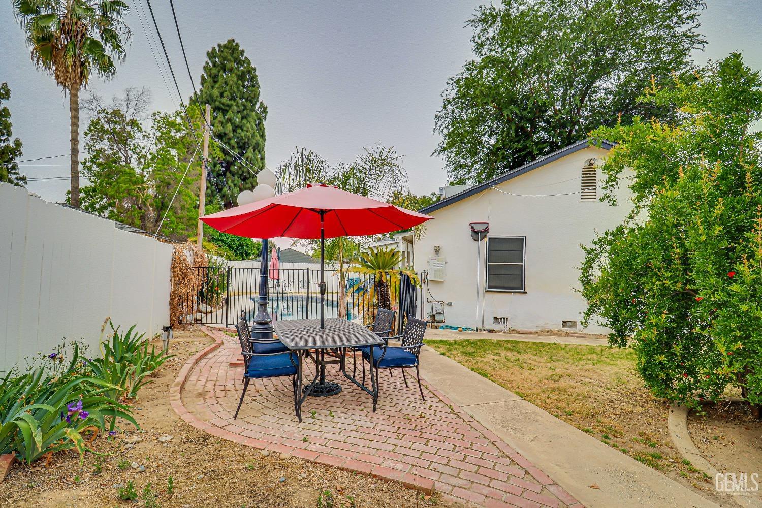 Undisclosed Address Bakersfield, CA 93305 - Photo 21 of 24 a view of a house with backyard and sitting area