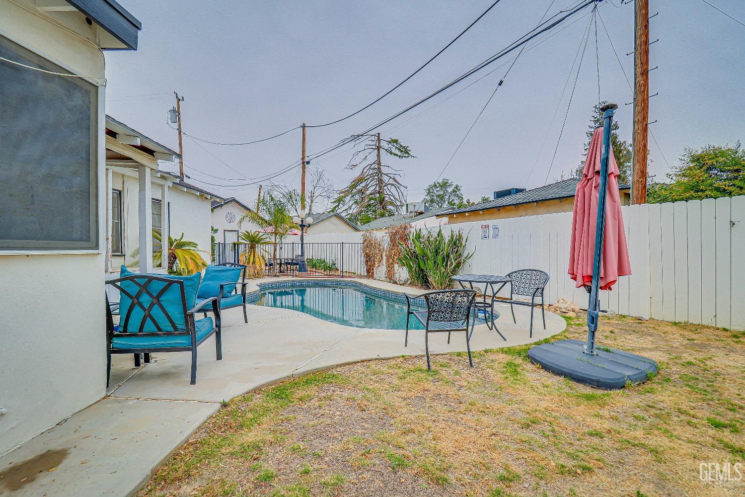 Undisclosed Address Bakersfield, CA 93305 - Photo 23 of 24 a view of a chairs and tables in patio