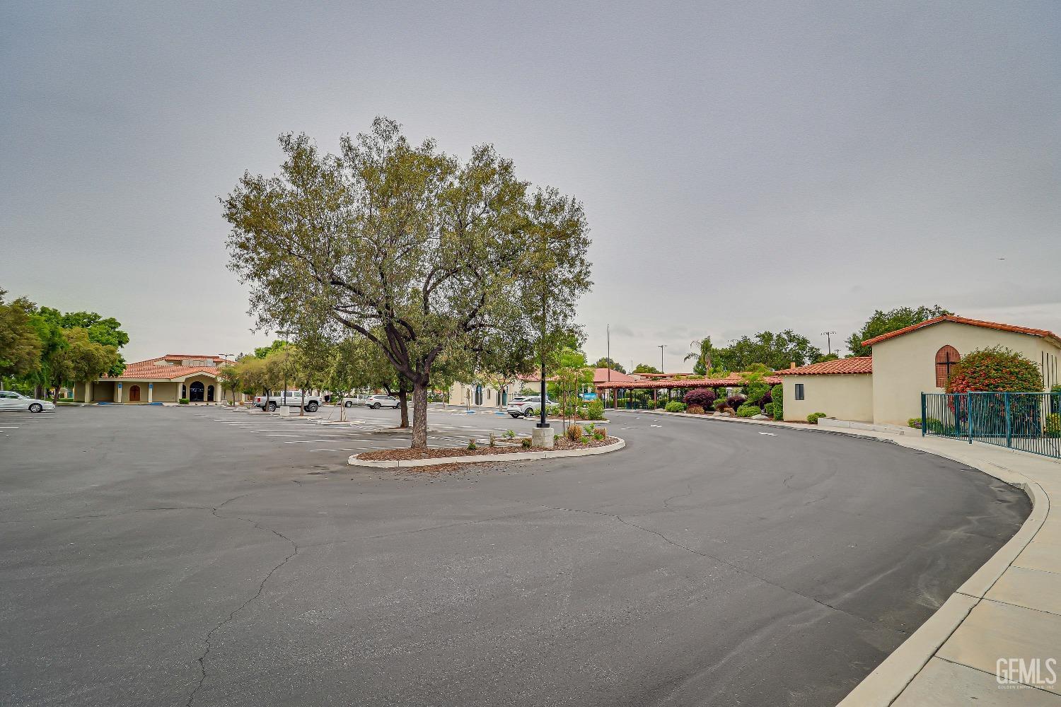 Undisclosed Address Bakersfield, CA 93305 - Photo 24 of 24 a view of a street with a houses