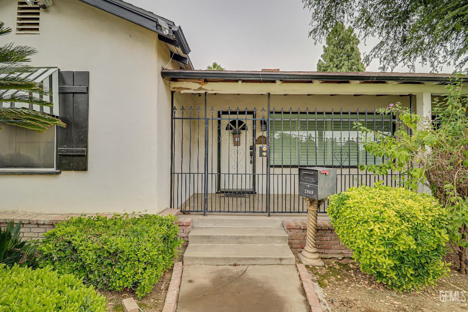 Undisclosed Address Bakersfield, CA 93305 - Photo 3 of 24 a front view of a house