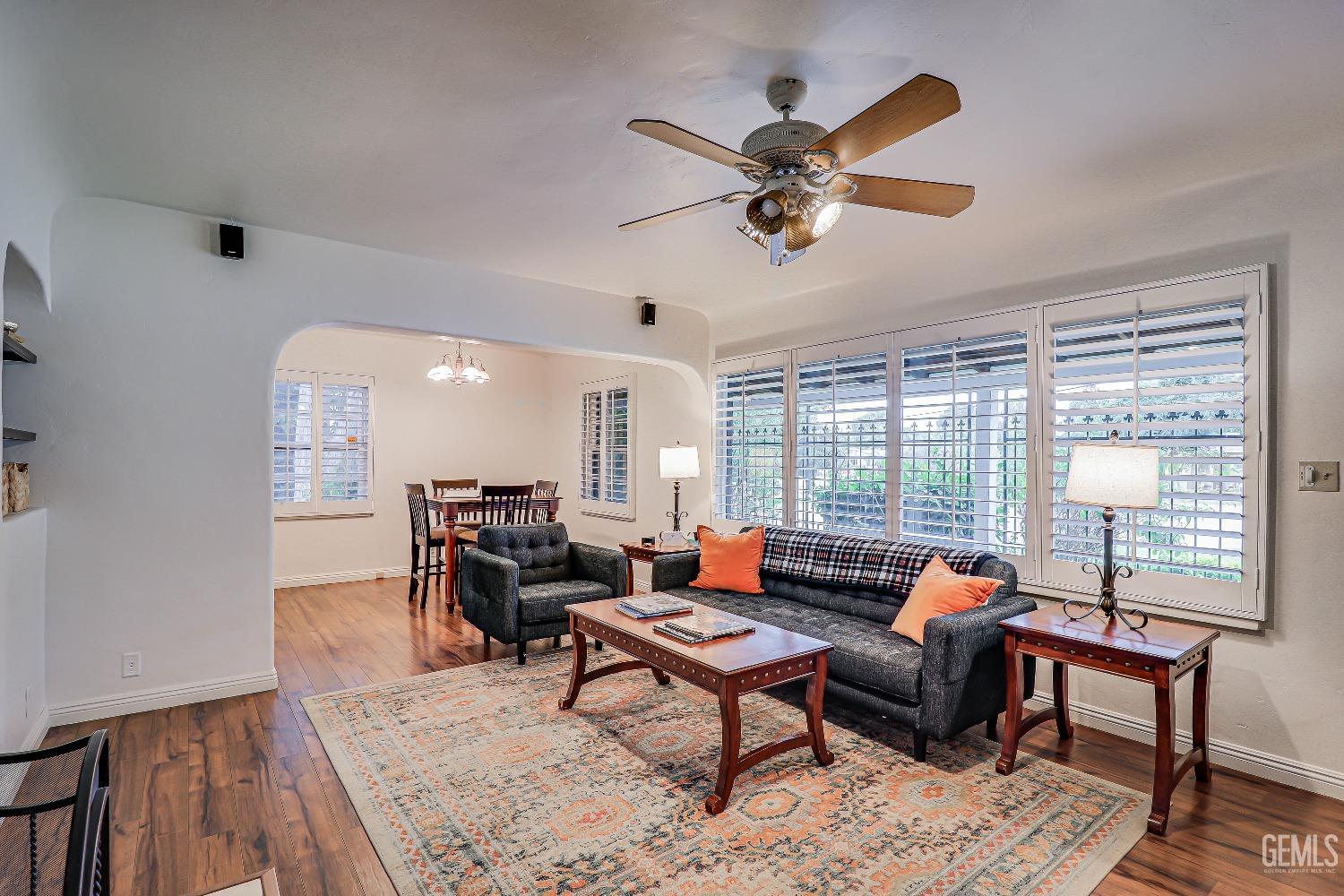 Undisclosed Address Bakersfield, CA 93305 - Photo 7 of 24 a living room with furniture and a large window