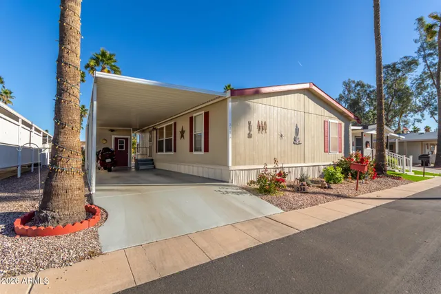 a front view of a house with a garage