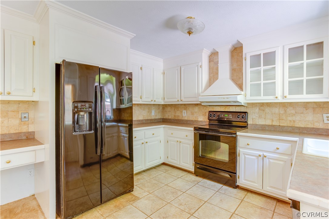 7460 Strath Road Henrico, VA 23231 - Photo 12 of 32 a kitchen with stainless steel appliances granite countertop a refrigerator sink and cabinets