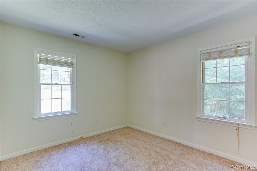 7460 Strath Road Henrico, VA 23231 - Photo 16 of 32 an empty room with a window