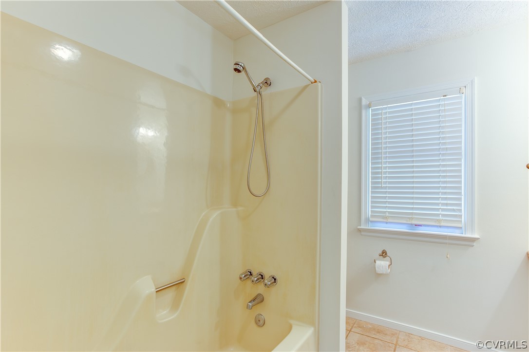 7460 Strath Road Henrico, VA 23231 - Photo 18 of 32 a bathroom with a shower