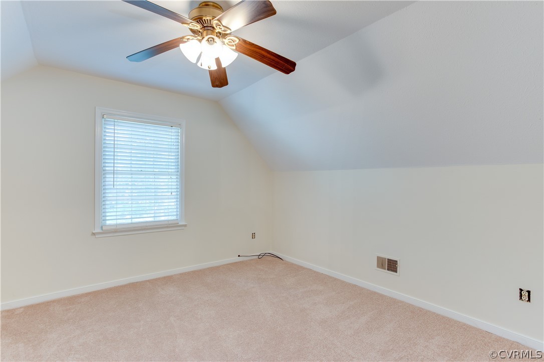 7460 Strath Road Henrico, VA 23231 - Photo 22 of 32 an empty room with a window and a fan