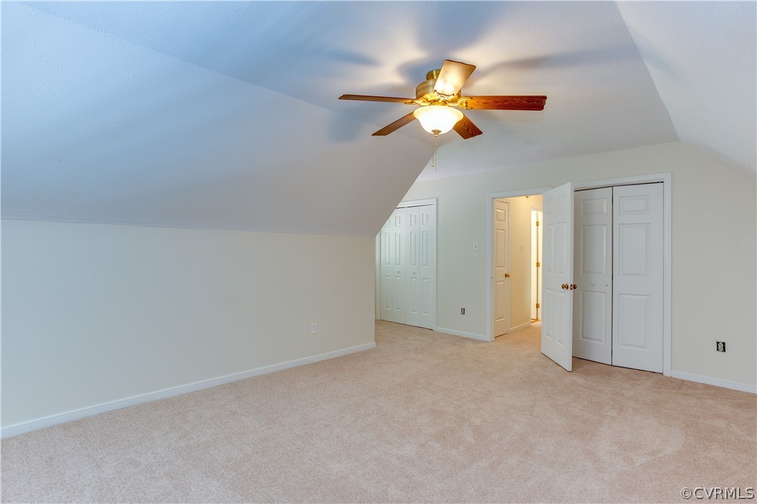 7460 Strath Road Henrico, VA 23231 - Photo 23 of 32 a view of an empty room with a chandelier fan