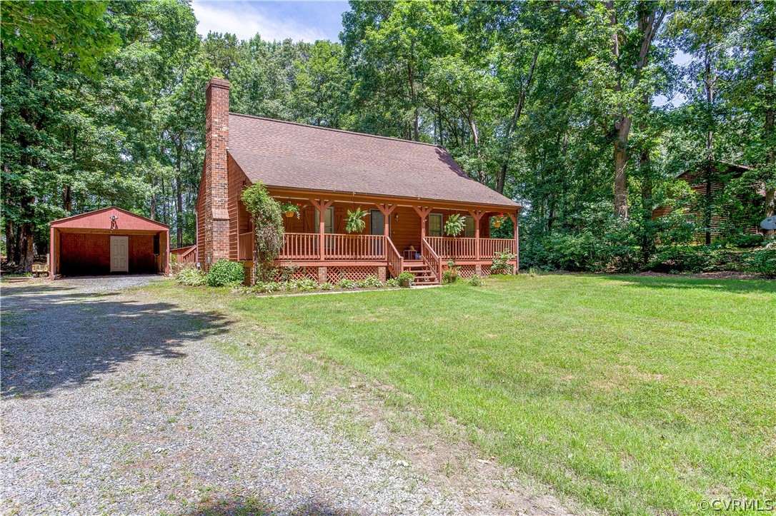 7460 Strath Road Henrico, VA 23231 - Photo 3 of 32 a view of a house with a yard porch and sitting area