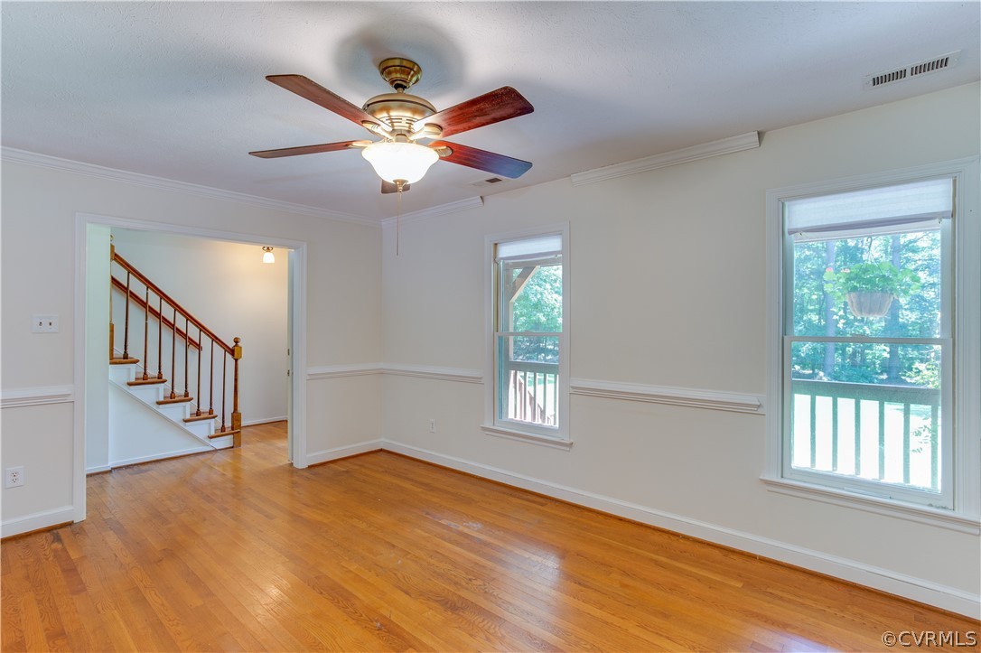 7460 Strath Road Henrico, VA 23231 - Photo 8 of 32 a view of an empty room with wooden floor and a window