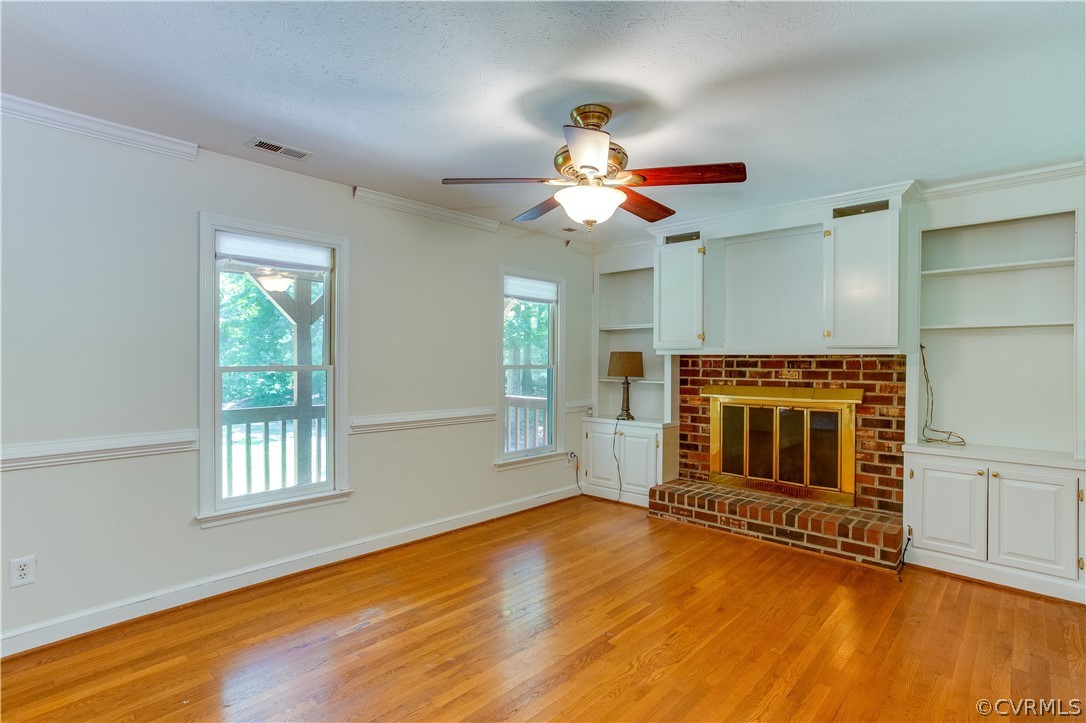 7460 Strath Road Henrico, VA 23231 - Photo 9 of 32 a view of an empty room with window and wooden floor