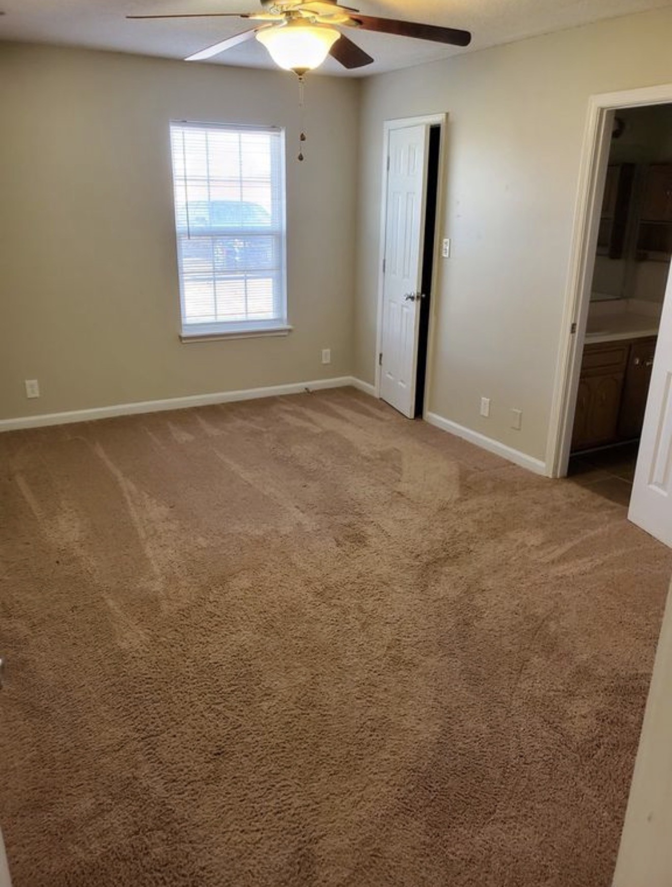 133 Bumpus Mill Road Oak Grove, KY 42262 - Photo 6 of 8 an empty room with windows and closet