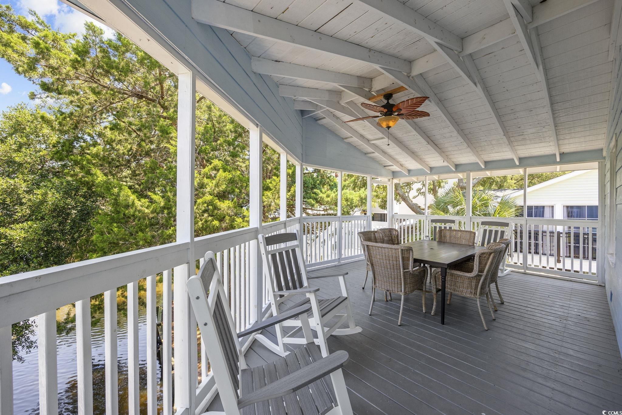 222 Calhoun Drive Murrells Inlet, SC 29576 - Photo 18 of 40 Deck with a water view and ceiling fan