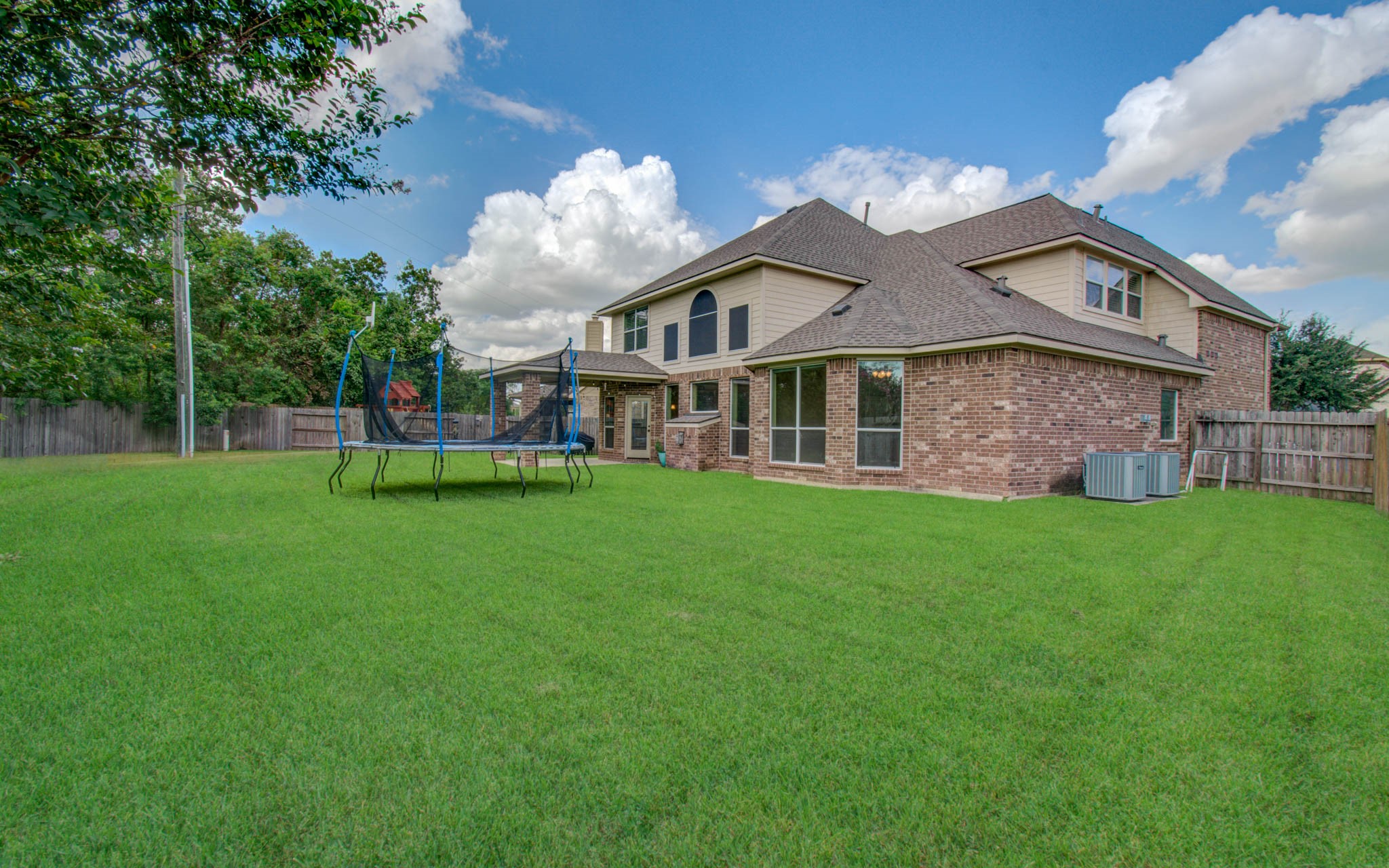 21331 Parham Circle Spring, TX 77388 - Photo 43 of 48 This Texas sized yard is ready for memories to be made here.