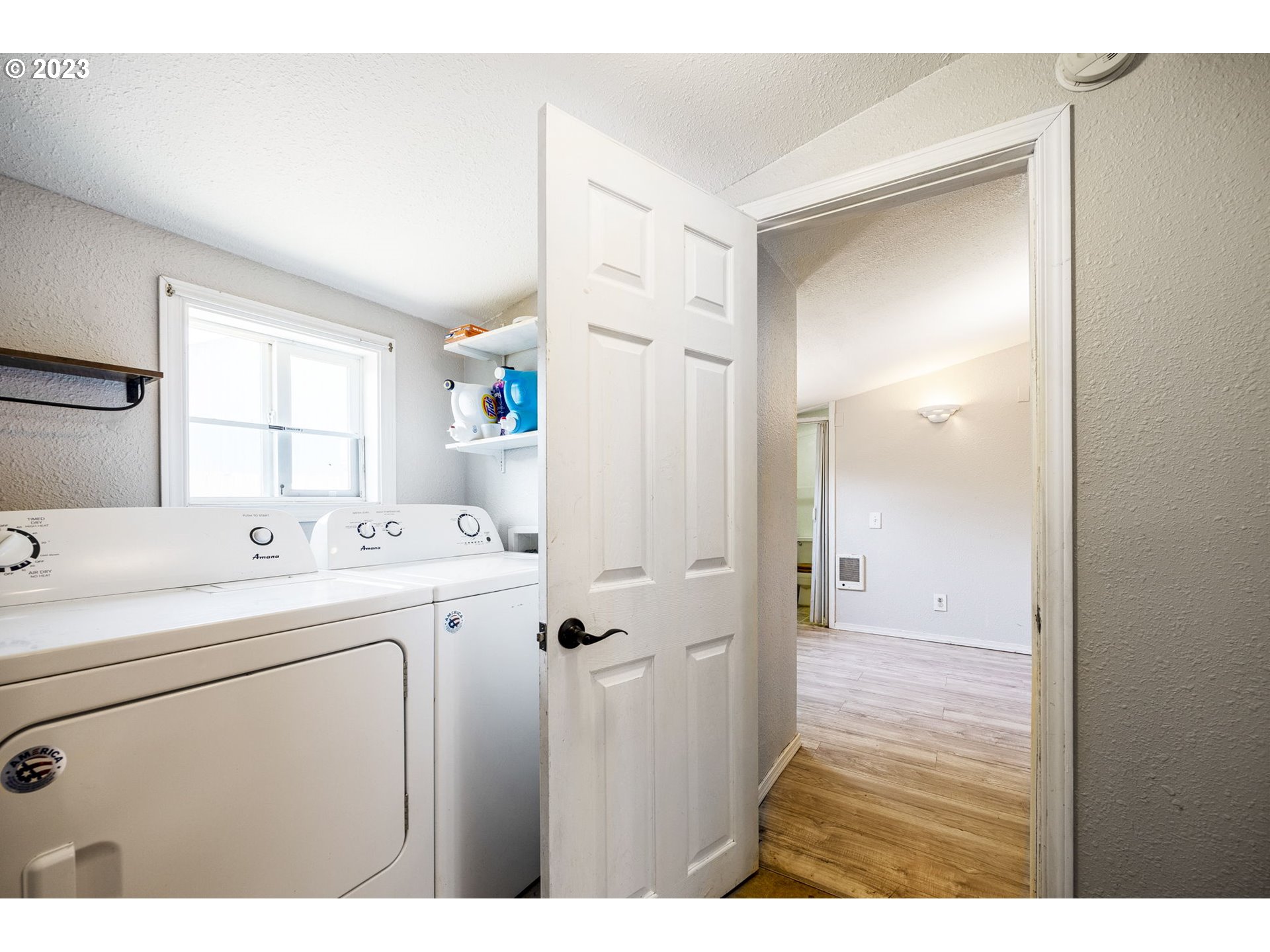 2065 G Street Springfield, OR 97477 - Photo 21 of 37 a view of a bathroom with a sink and a window