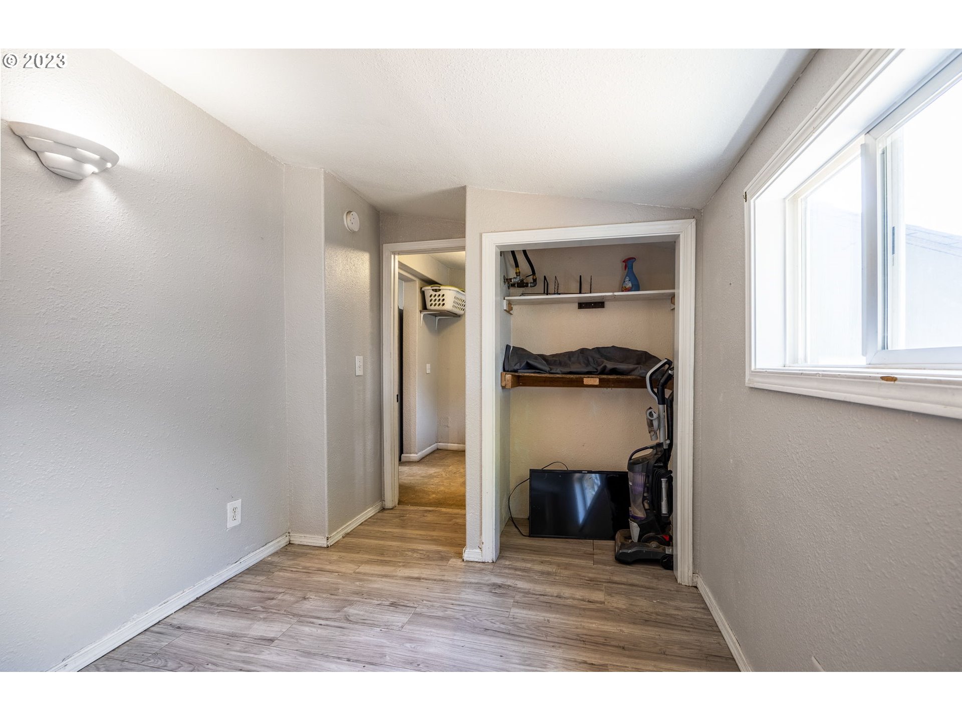 2065 G Street Springfield, OR 97477 - Photo 23 of 37 a view of a room with a fireplace and window
