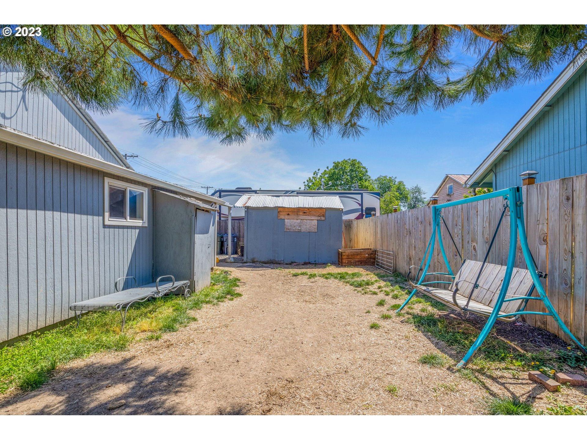 2065 G Street Springfield, OR 97477 - Photo 29 of 37 a backyard of a house with barbeque oven