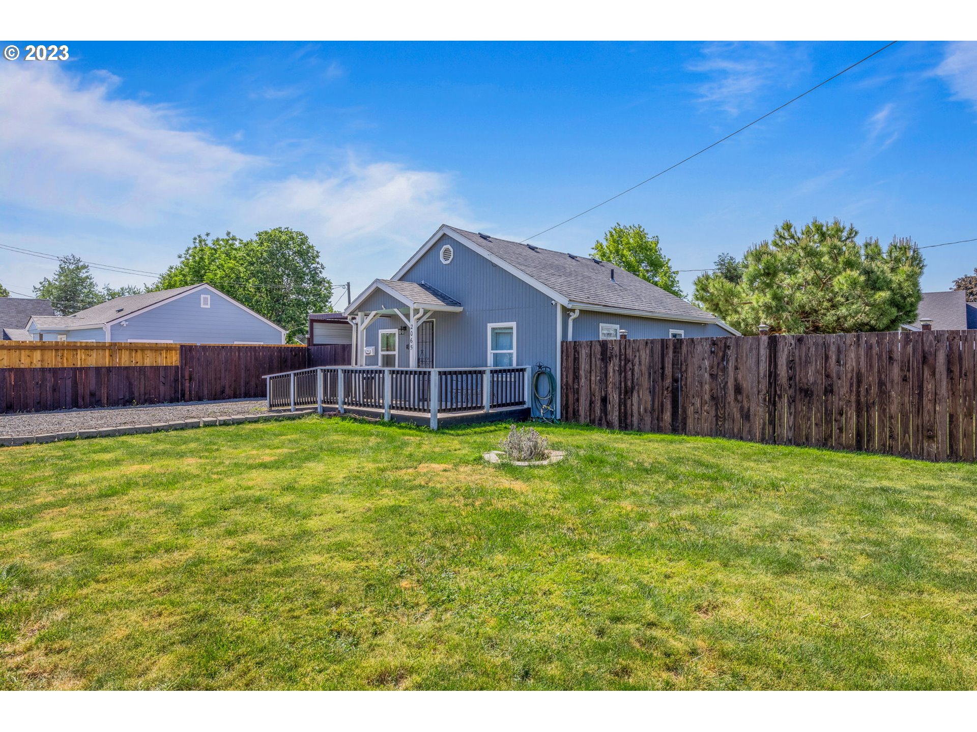 2065 G Street Springfield, OR 97477 - Photo 34 of 37 a view of a house with a garden