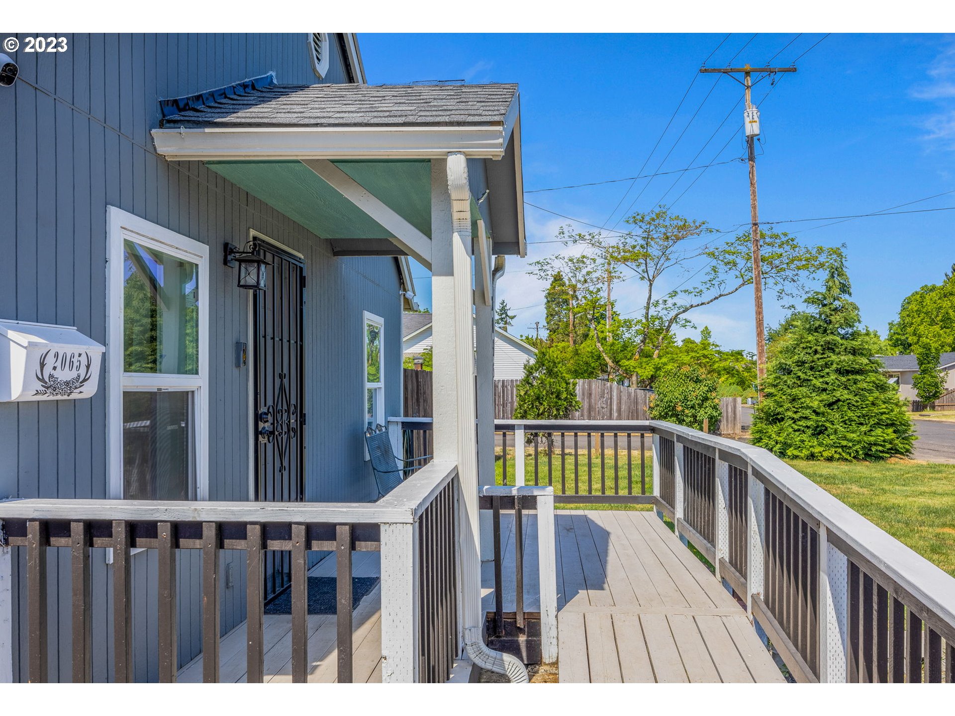 2065 G Street Springfield, OR 97477 - Photo 37 of 37 a view of a wooden deck
