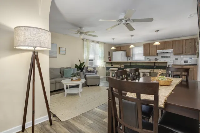a view of a dining room with furniture