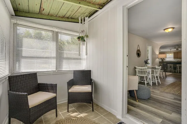 a living room with furniture and a table