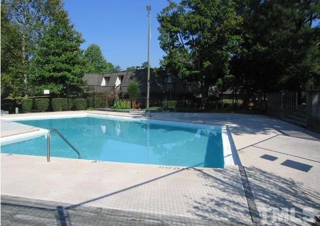 a view of a swimming pool with an outdoor space