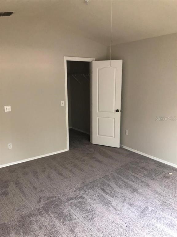 3397 South Kirkman Road, Unit 1435 Orlando, FL 32811 - Photo 5 of 11 a view of an empty room