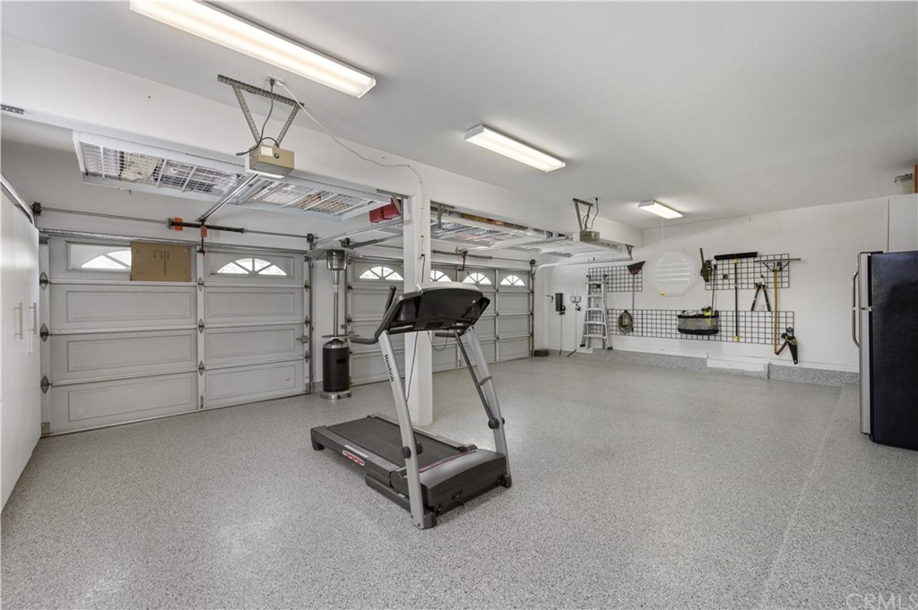 5817 Royale Place Riverside, CA 92506 - Photo 35 of 64 3-car garage with built-in cabinets, wall storage, overhead storage...