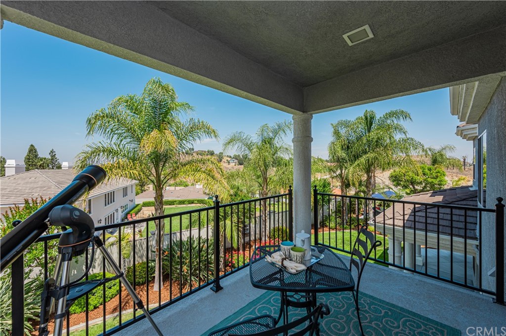 5817 Royale Place Riverside, CA 92506 - Photo 44 of 64 Master suite balcony to enjoy Mountain, hilltop, neighborhood, and sunset views.