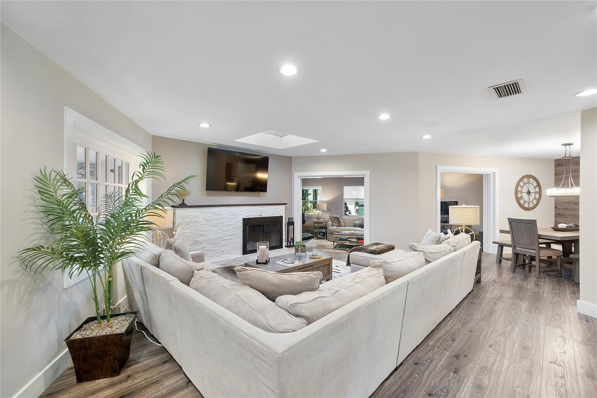 5351 Godfrey Road Parkland, FL 33067 - Photo 14 of 95 a living room with furniture fireplace and potted plant