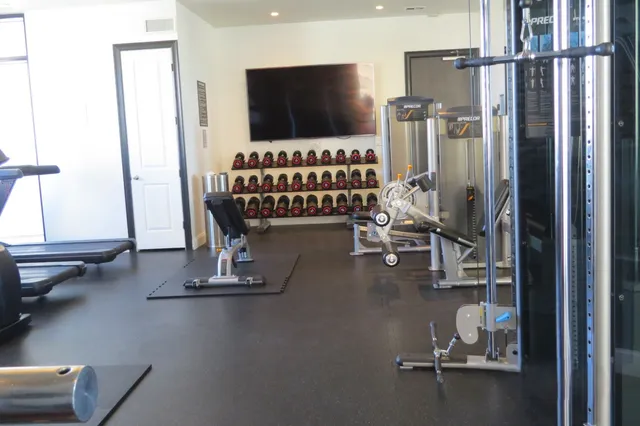 a view of a room with gym equipment