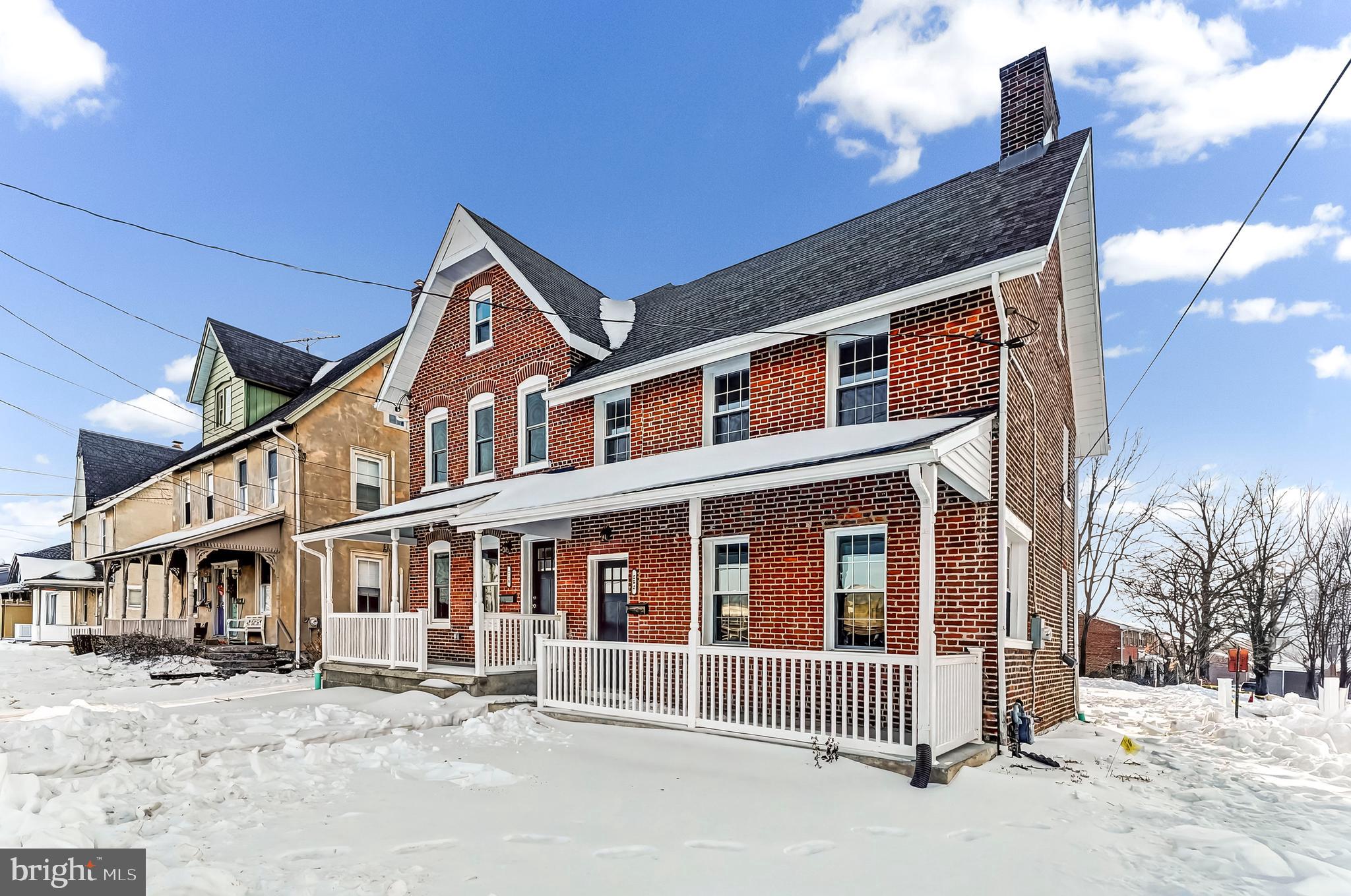 232 South 5th Street Oxford, PA 19363 - Photo 26 of 31 a front view of a building with a yard