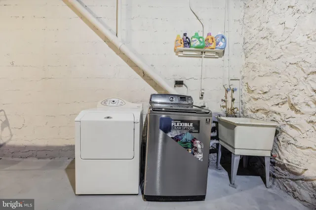 a utility room with dryer and washer