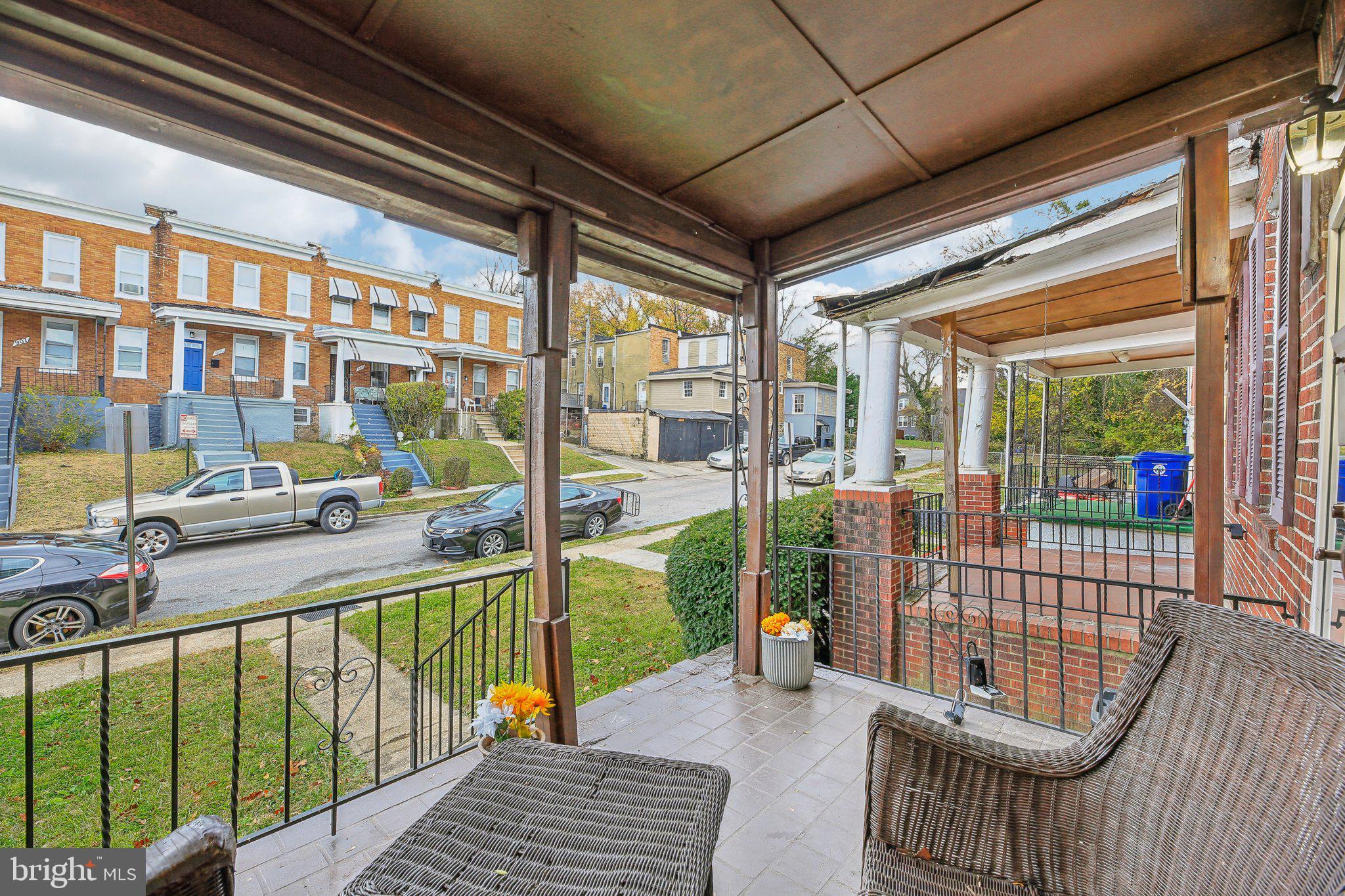 904 North Rosedale Street Baltimore, MD 21216 - Photo 5 of 38 a view of a porch with a floor to ceiling window