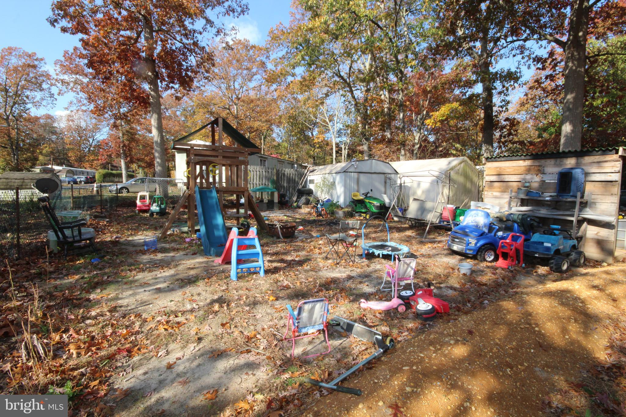 459 Mistle Road Millville, NJ 08332 - Photo 16 of 24 a view of outdoor space with seating area and trees