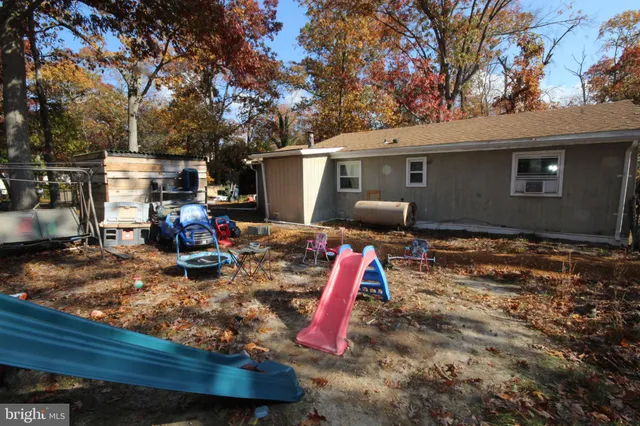 a view of outdoor space yard deck patio and fire pit
