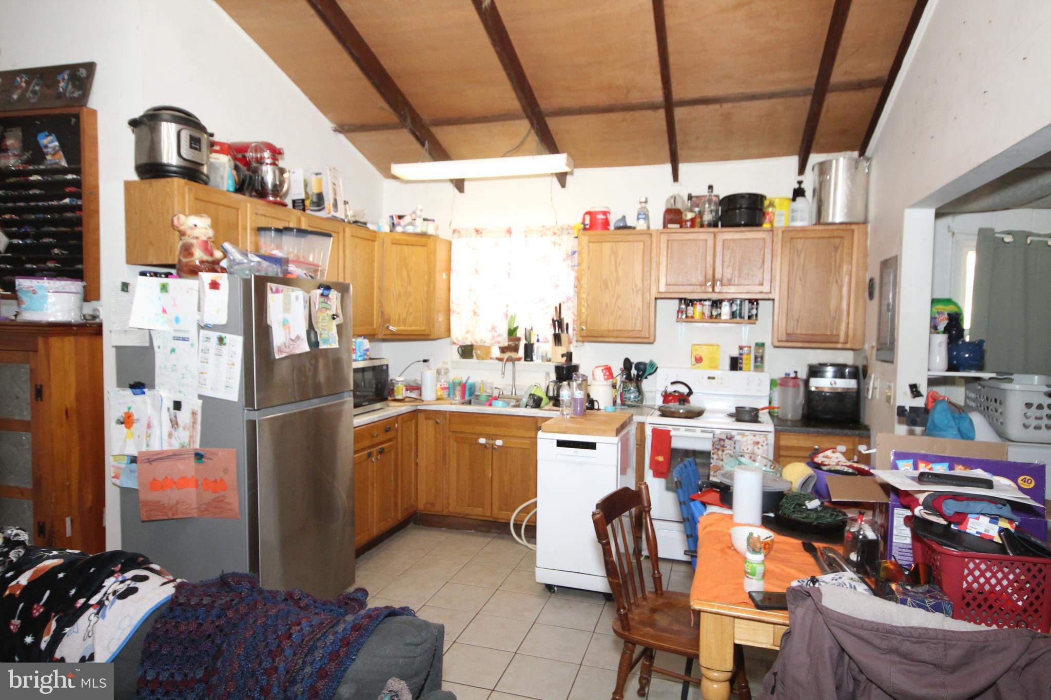 459 Mistle Road Millville, NJ 08332 - Photo 6 of 24 a room with lots of appliances and furniture