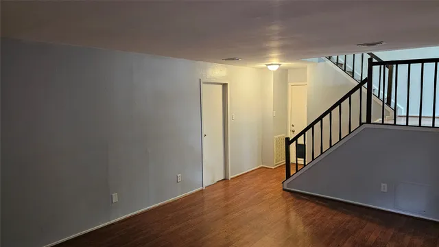 a view of entryway with wooden floor