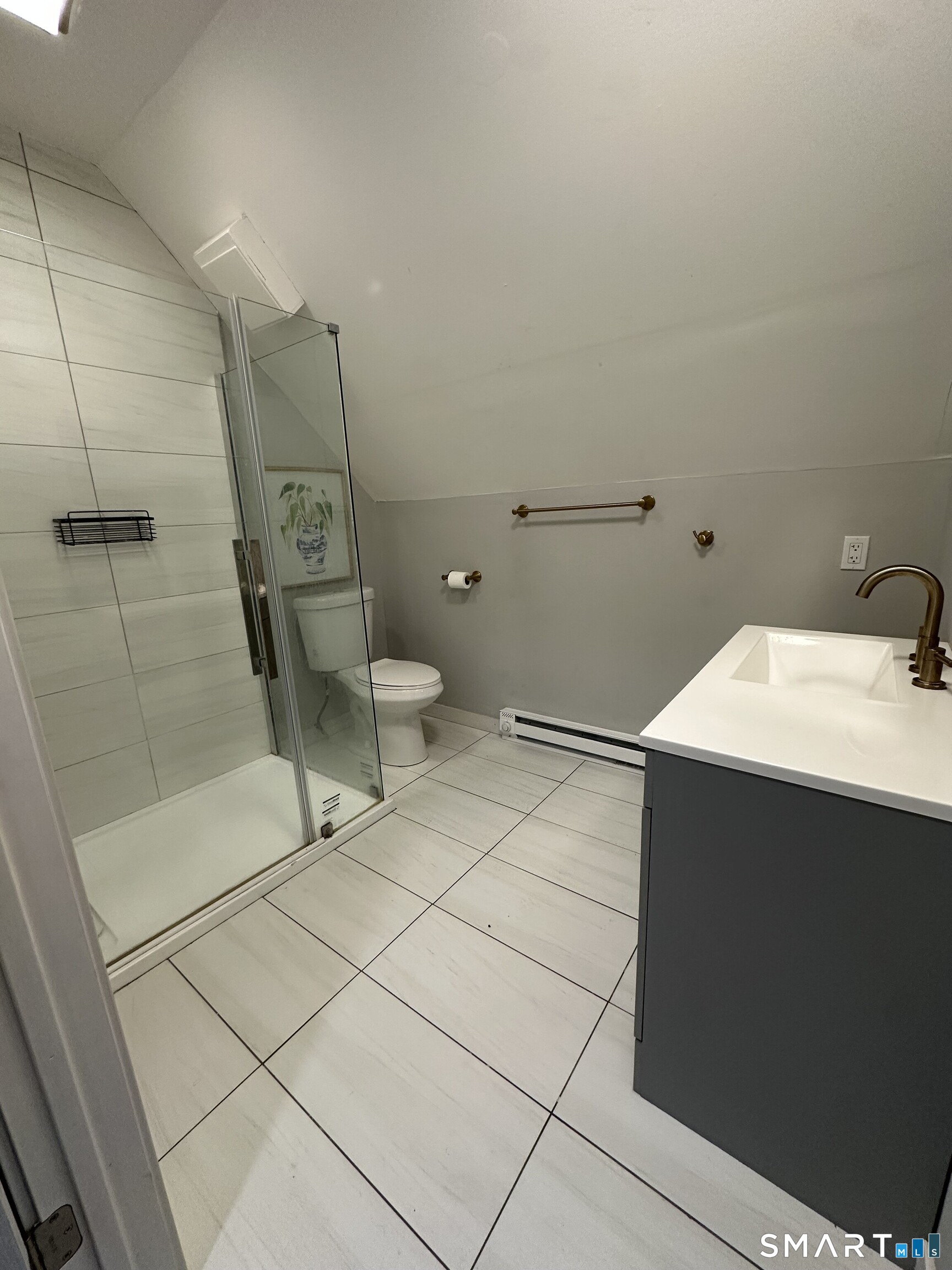 27 East 9th Street Derby, CT 06418 - Photo 16 of 22 a bathroom with a sink and a toilet