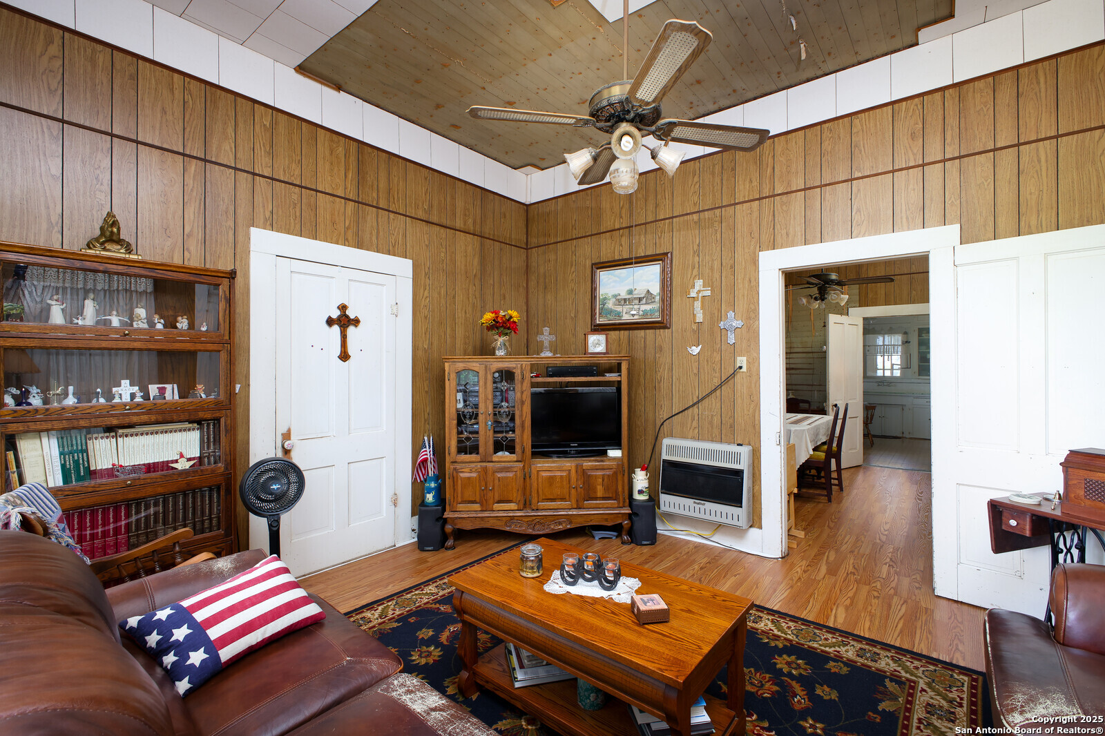 4901 Lower Seguin Road Cibolo, TX 78108 - Photo 22 of 41 a living room with furniture a dining table and chairs with wooden floor