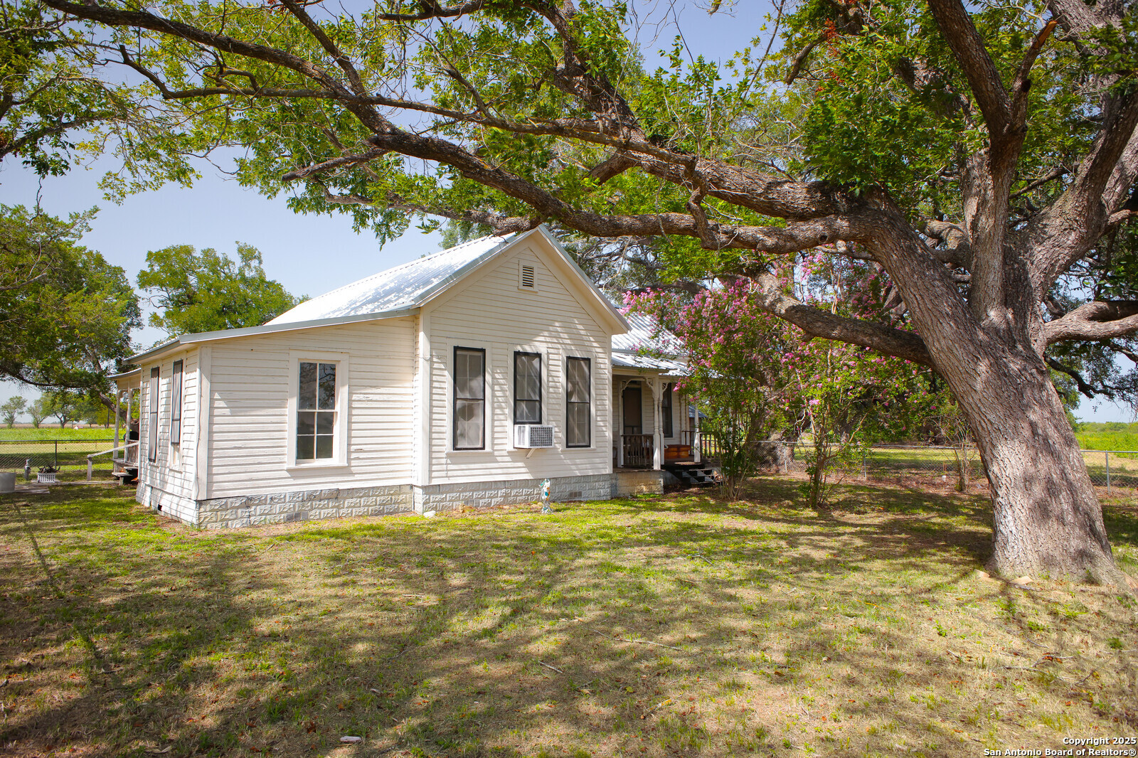 4901 Lower Seguin Road Cibolo, TX 78108 - Photo 7 of 41 a house that has a tree in front of the house