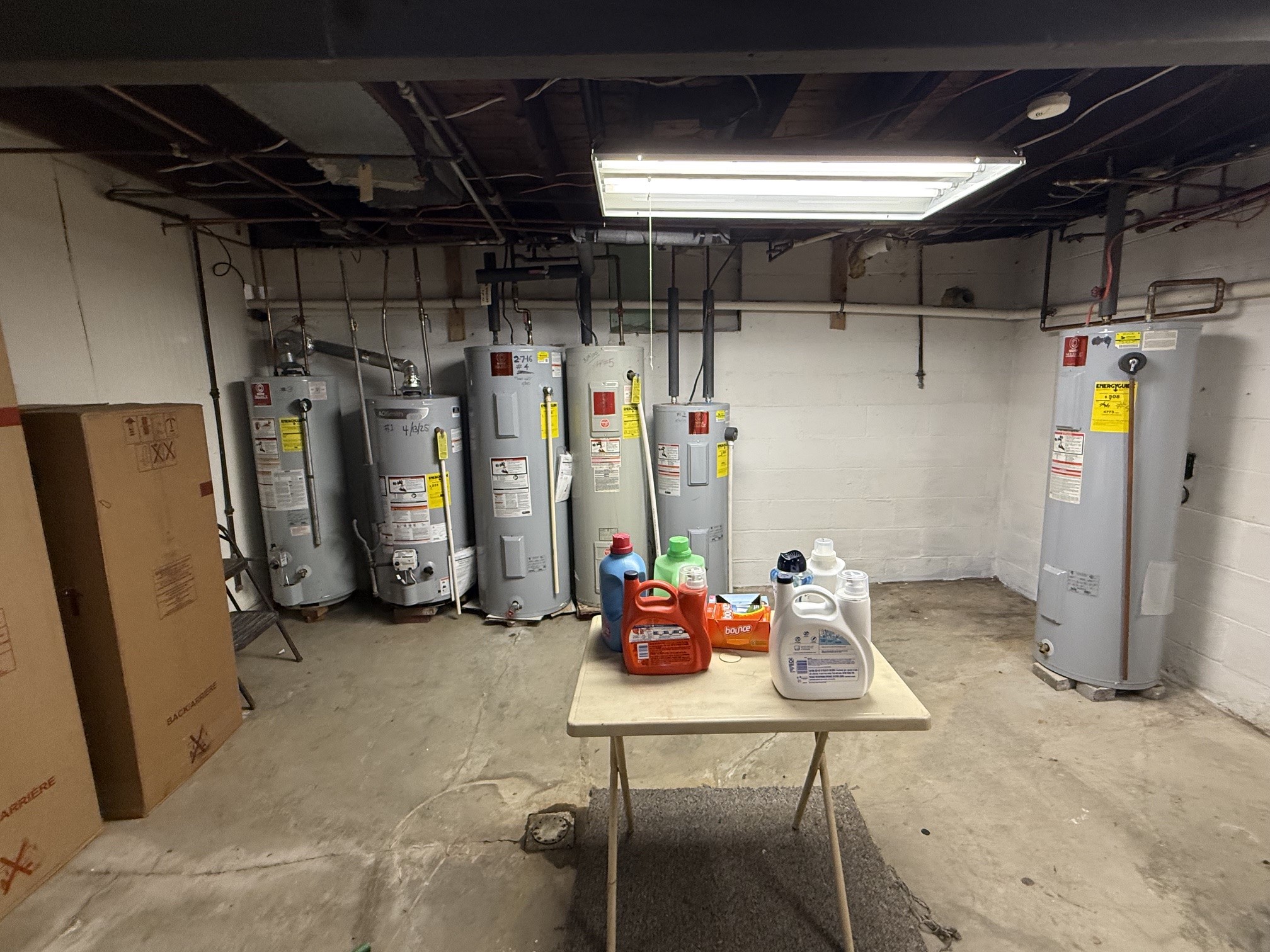 1630 West Gore Road Erie, PA 16509 - Photo 41 of 50 Four Electric Water Heaters, Two Gas