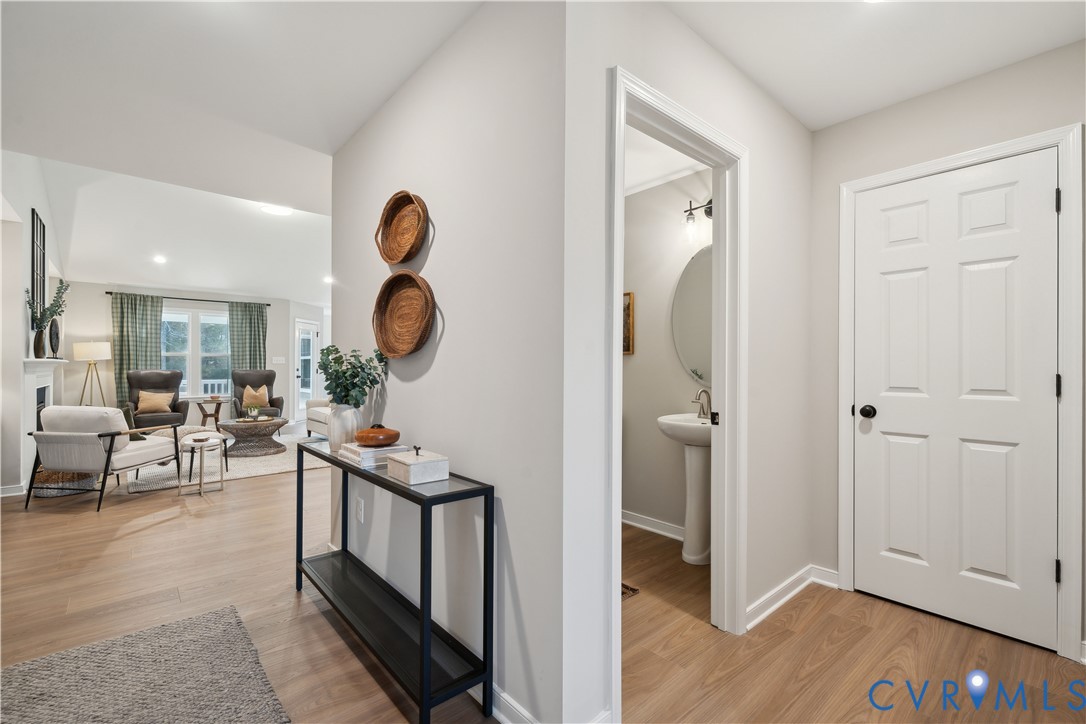 535 Wendenburg Terrace, Unit MODEL Aylett, VA 23009 - Photo 16 of 31 Hallway with light wood-style floors and recessed