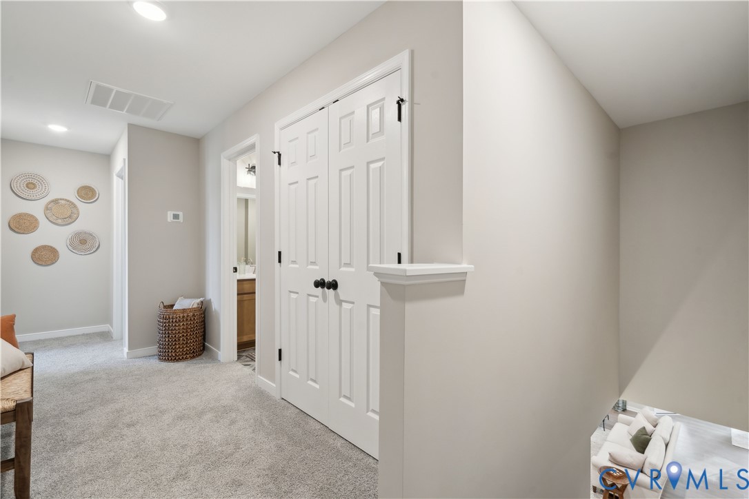 535 Wendenburg Terrace, Unit MODEL Aylett, VA 23009 - Photo 22 of 31 Corridor with light carpet and recessed lighting
