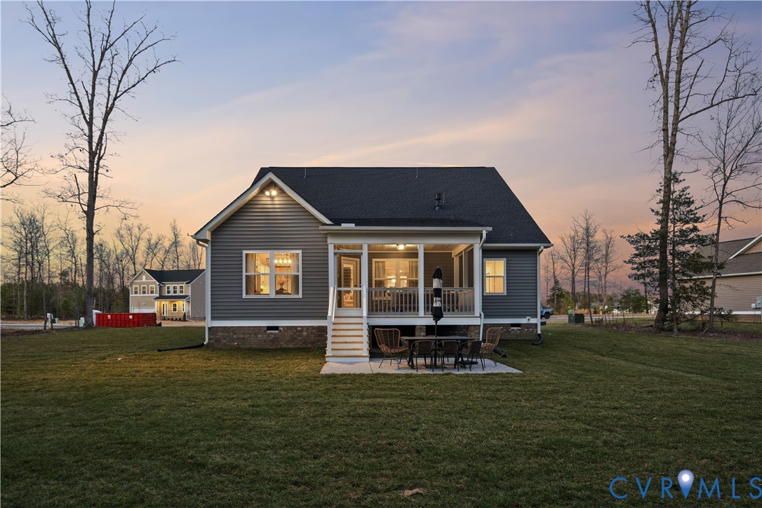535 Wendenburg Terrace, Unit MODEL Aylett, VA 23009 - Photo 30 of 31 Back of house at dusk with crawl space, a patio ar