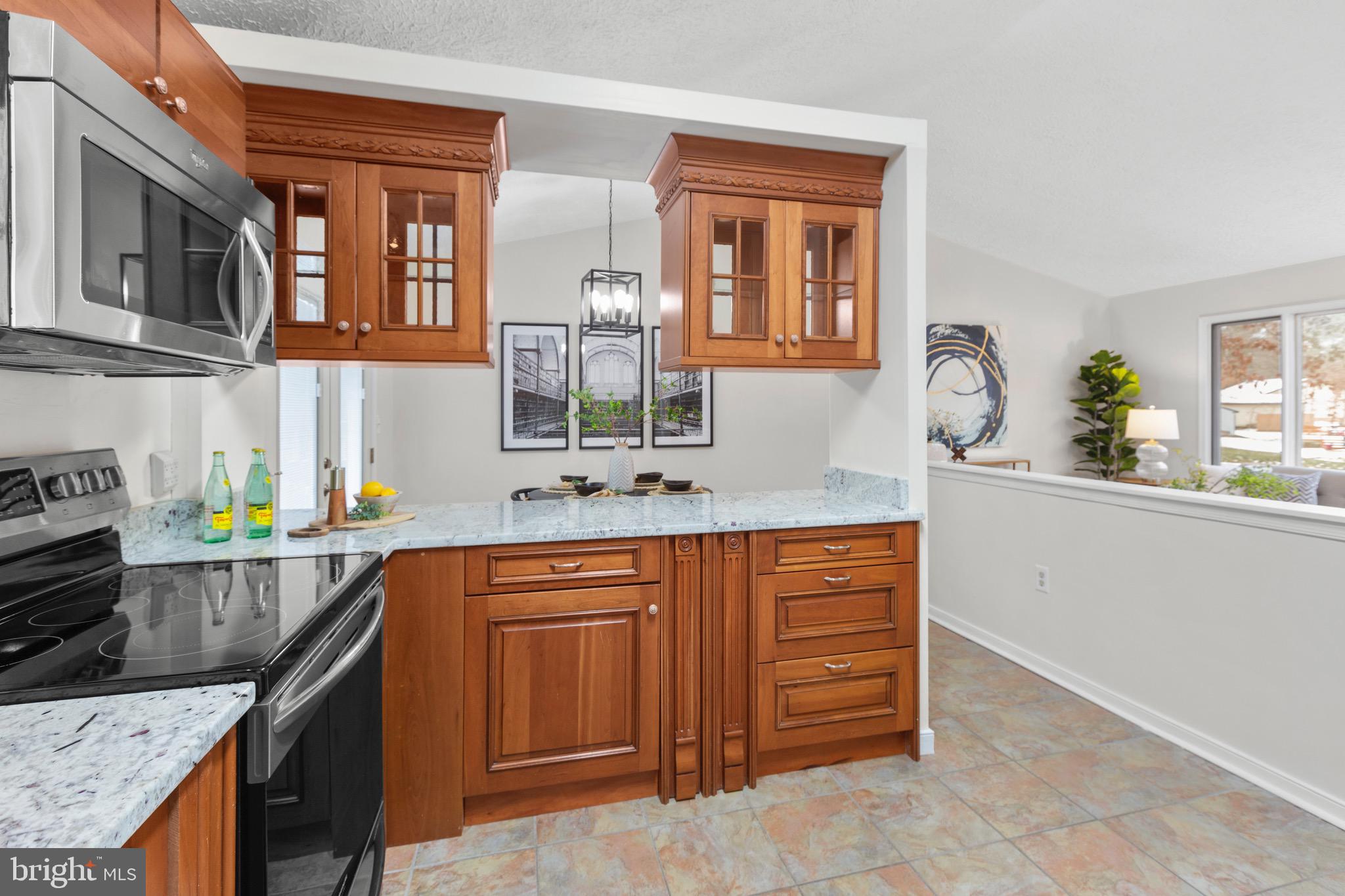 915 Kent Drive Ruther Glen, VA 22546 - Photo 18 of 42 Kitchen with Granite and SS Appliances