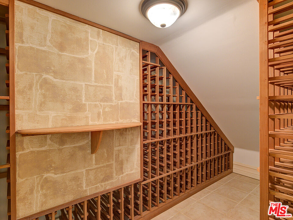 5003 Roma Court Venice, CA 90292 - Photo 16 of 34 a view of staircase with wooden floor and white walls