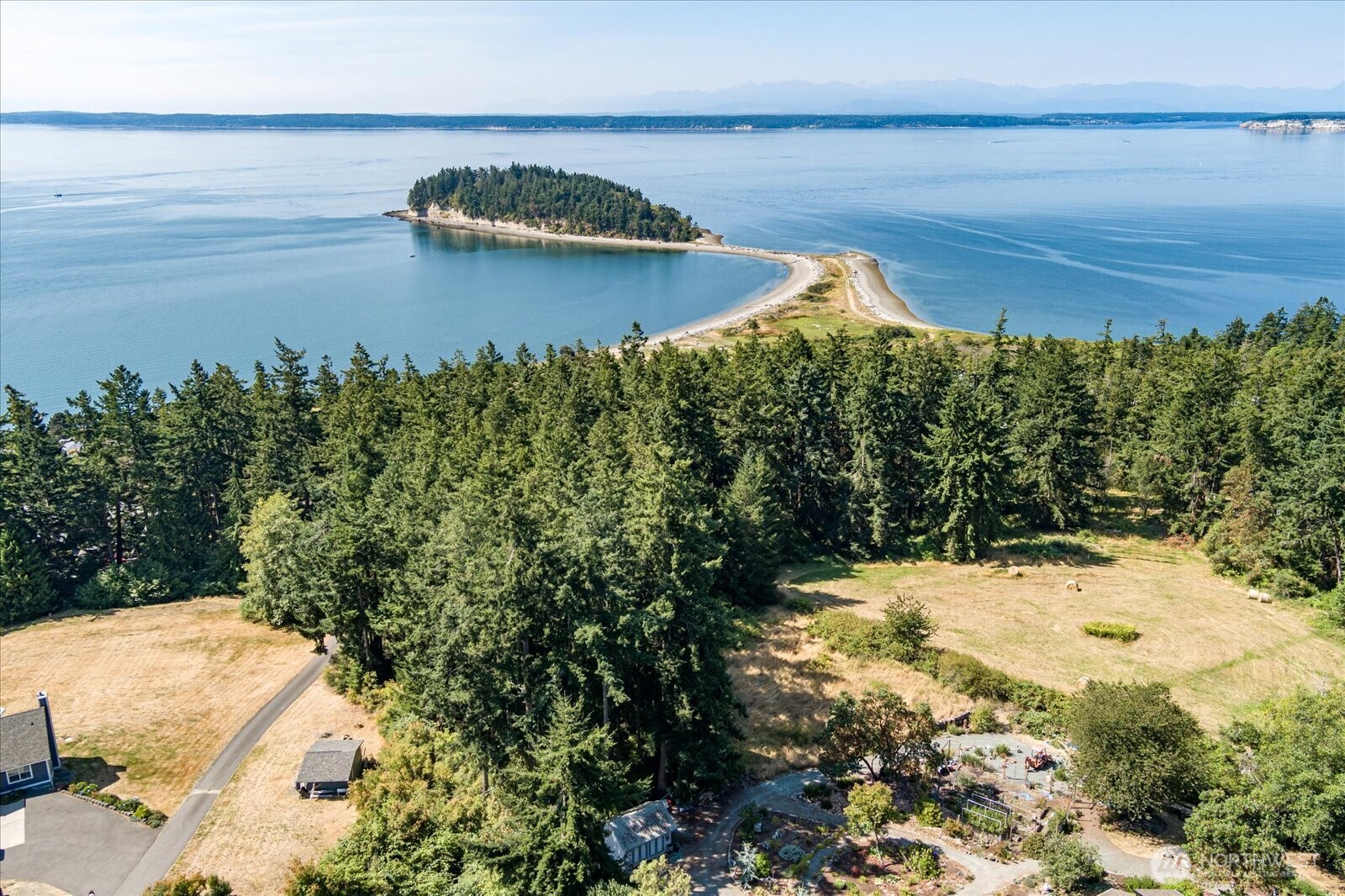 0 Old Polnell Road Oak Harbor, WA 98277 - Photo 1 of 10 a view of a lake with a mountain